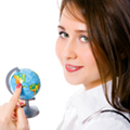 portrait pretty girl with globe show finger north america