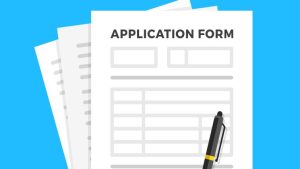 A pen resting on a job application form.