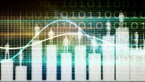 Bar graphs with the outline of business people standing in front of a background of data.