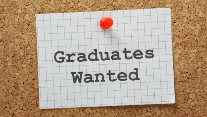 9 Things You Need to Know About Graduate Recruitment - A hiring sign that says graduates wanted.