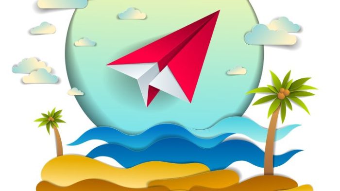 8 Professional Out-Of-Office Email Templates - a email send paper plane flying over a beach.