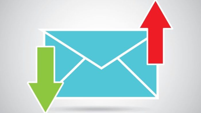 5 Auto-Reply Messages For Your Business Emails - an email symbol with letters pointing up and down.