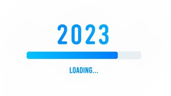The Power of Accountability: How to Stay on Track with Mid-Year Goals - a 2023 sign with a loading bar underneath filled halfway.