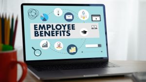 Capitalizing on Employee Benefits -an open laptop with a series of employee benefits with different icons on the screen.