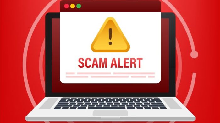 Recruitment Scams Are Targeting Job Seekers - a laptop screen with SCAM ALERT! on the screen, with a bright red background.