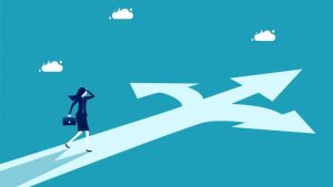 Navigating Career Shifts - How to Successfully Transition to a New Professional Path - a business person standing on a road the breaks into three different directions.