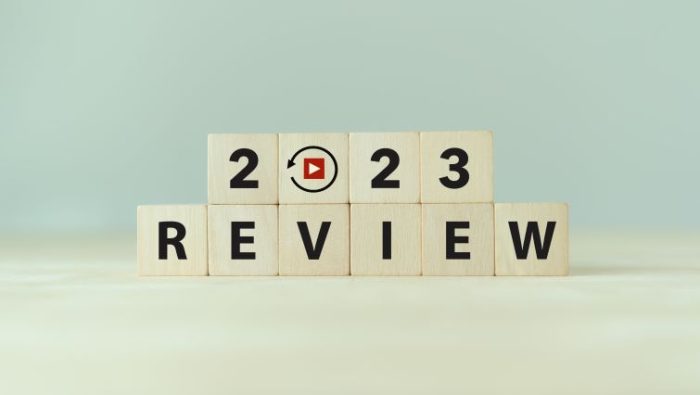 Your 2023 End-Of-Year Review - a series of wood blocks with letters that spell out 2023 review.
