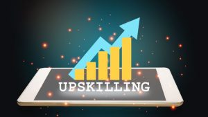 7 Best Upskilling Platforms for Workforces in 2024 - the word UPSKILLING hovering over a smartphone used for online learning.