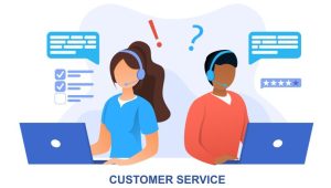 7 Steps to Revamp Your Exceptional Customer Service Resume - two workers sit at laptops on headsets providing customer service.
