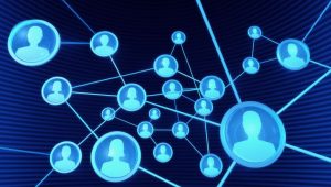 Networking 101 A Guide for New Graduates - a series of people icons connecting on a digital background.