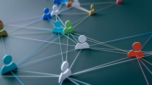 Networking During Your Internship -a profile of professional workers linked by a series of connections.